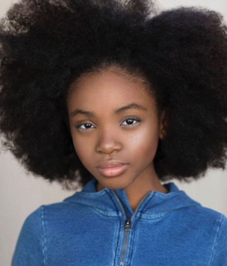 This Young Queen is Taking Over the Runway with Her Natural Hair