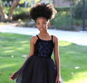 This Young Queen is Taking Over the Runway with Her Natural Hair